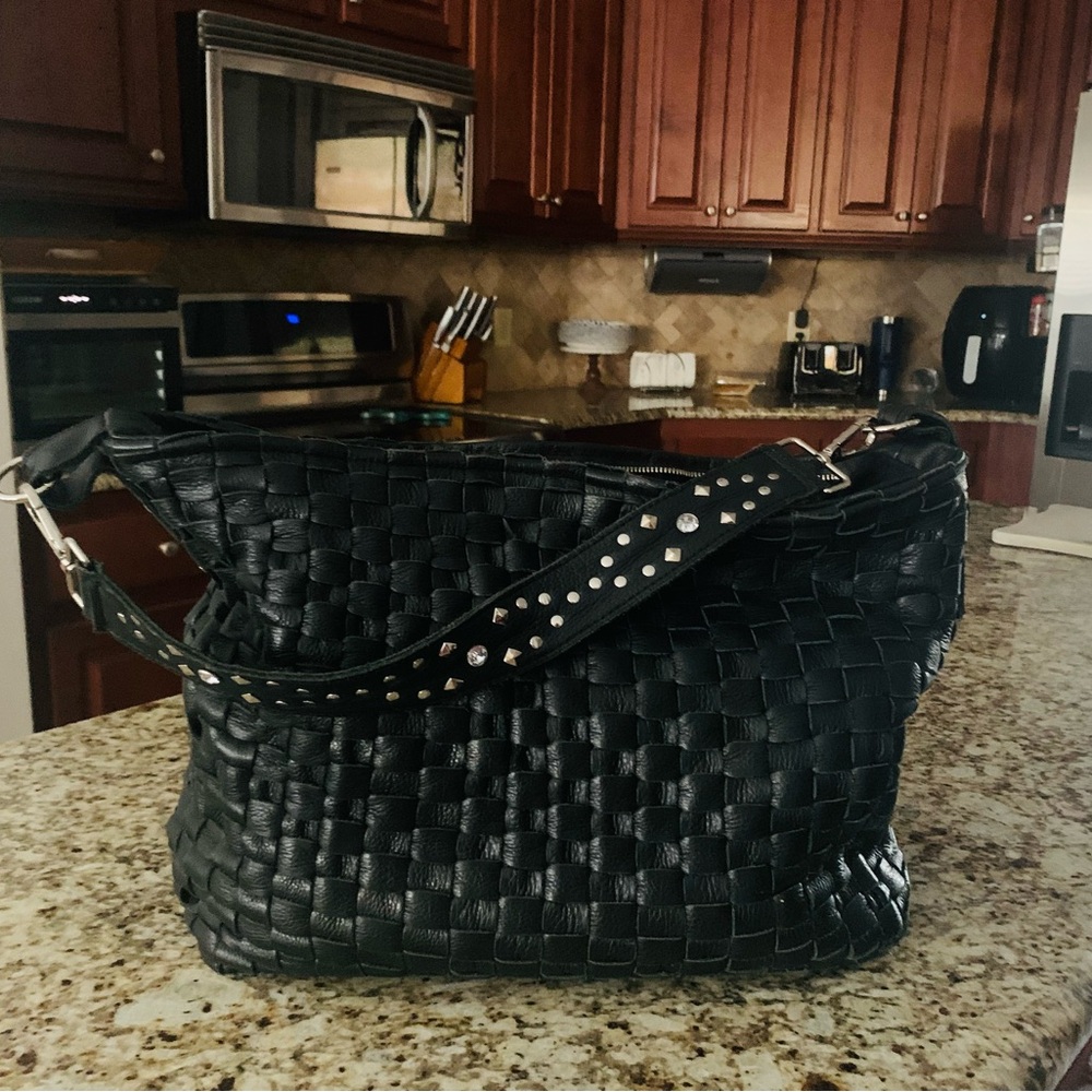 The Beth Dutton bag season 2, hand made by Canadian designer Karen Klasnik.
